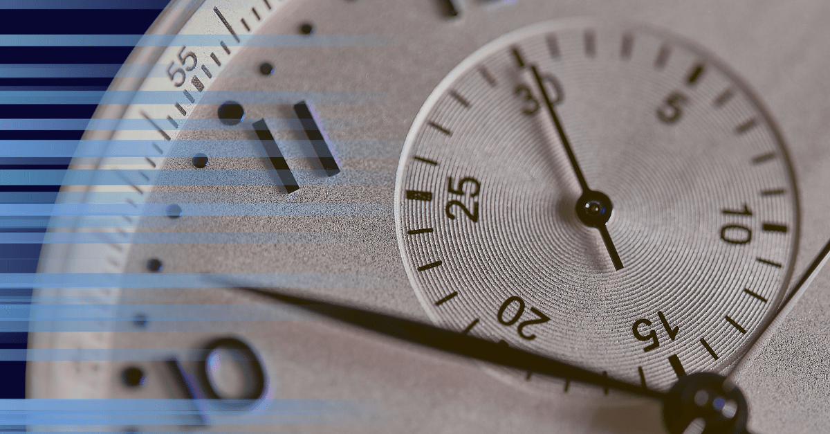 A closeup image of a watch with abstract blue lines suggesting speed over the top.
